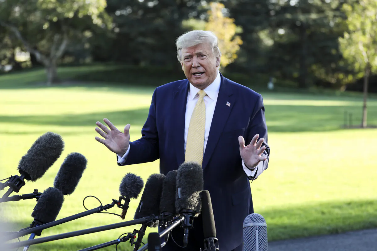 President Donald Trump speaks to media before departing the White House on Marine One on Oct. 11, 2019. (Charlotte Cuthbertson/The Epoch Times)