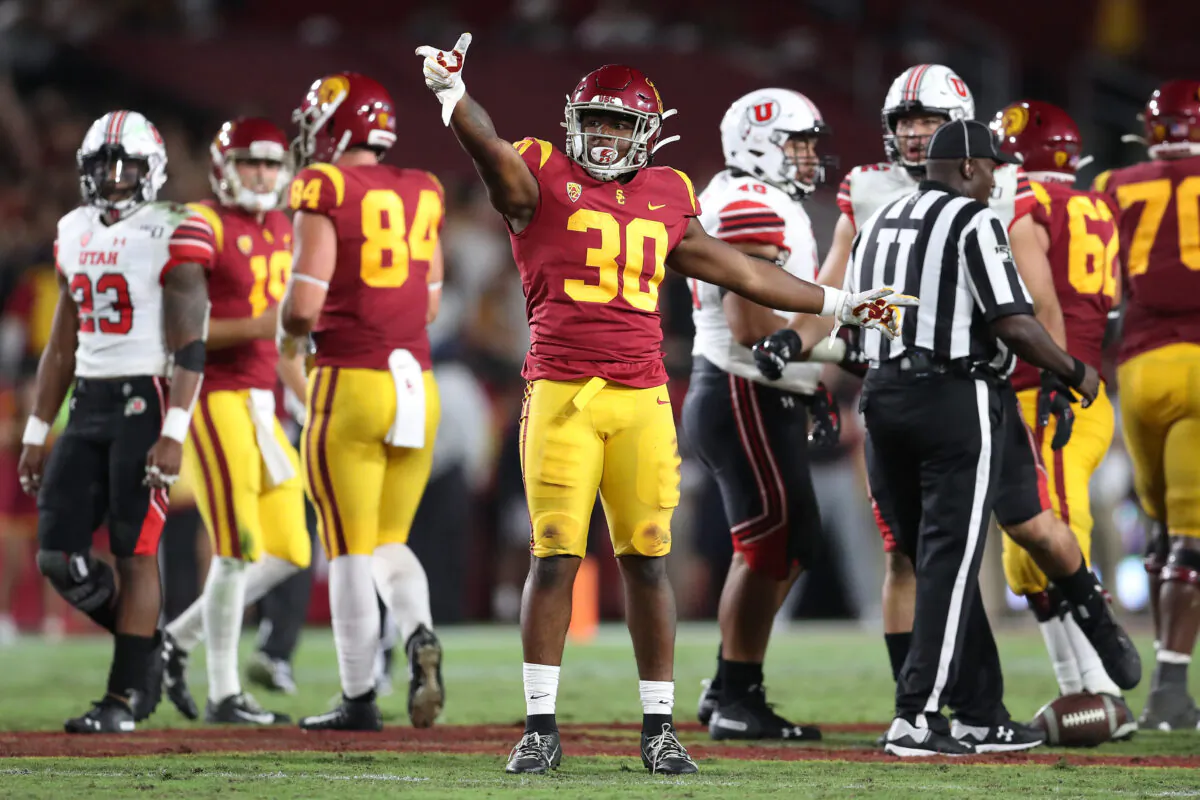 Running back Markese Stepp #30 of the USC Trojans reacts to his play earning a first down against the Utah Utes at Los Angeles Memorial Coliseum in Los Angeles on Sept. 20, 2019. (Meg Oliphant/Getty Images)
