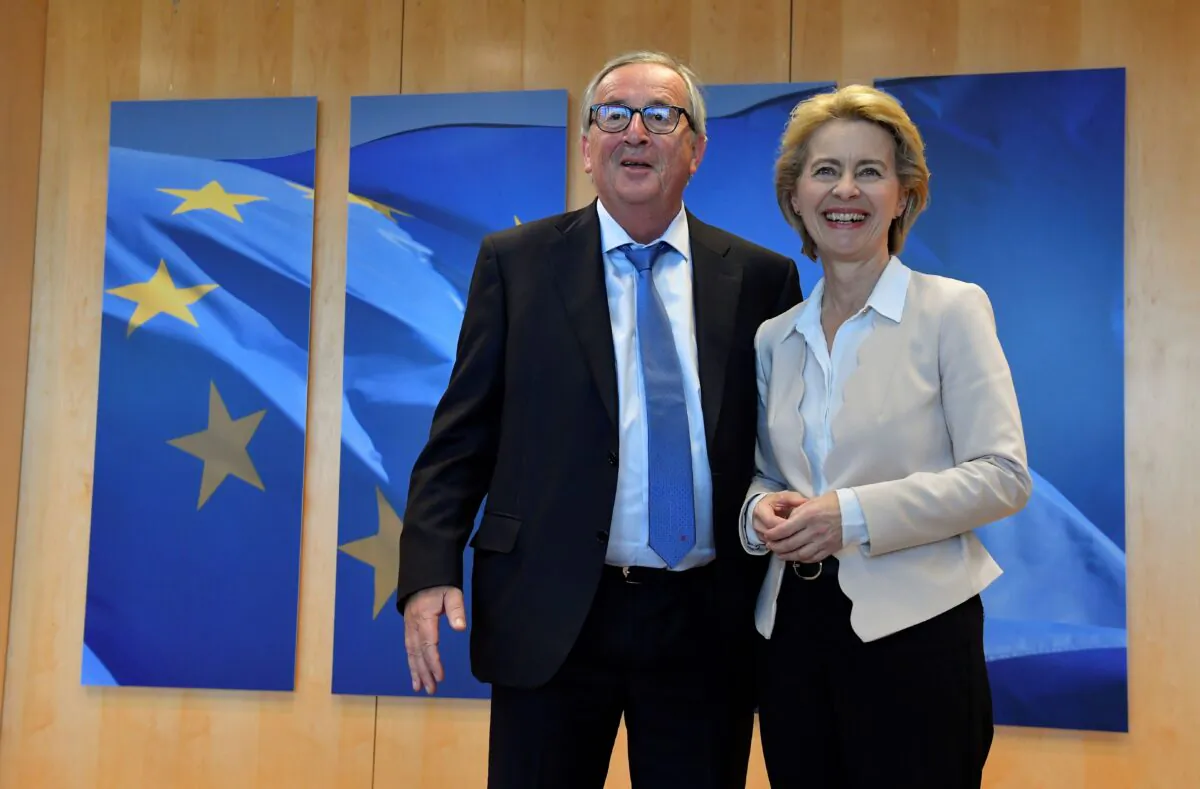 Outgoing President of the European Commission Jean-Claude Juncker (L) welcomes German Defense Minister and newly-appointed EU Commission Chief Ursula von der Leyen in Brussels, Belgium on July 23, 2019, 2019. (John Thys/AFP/Getty Images)
