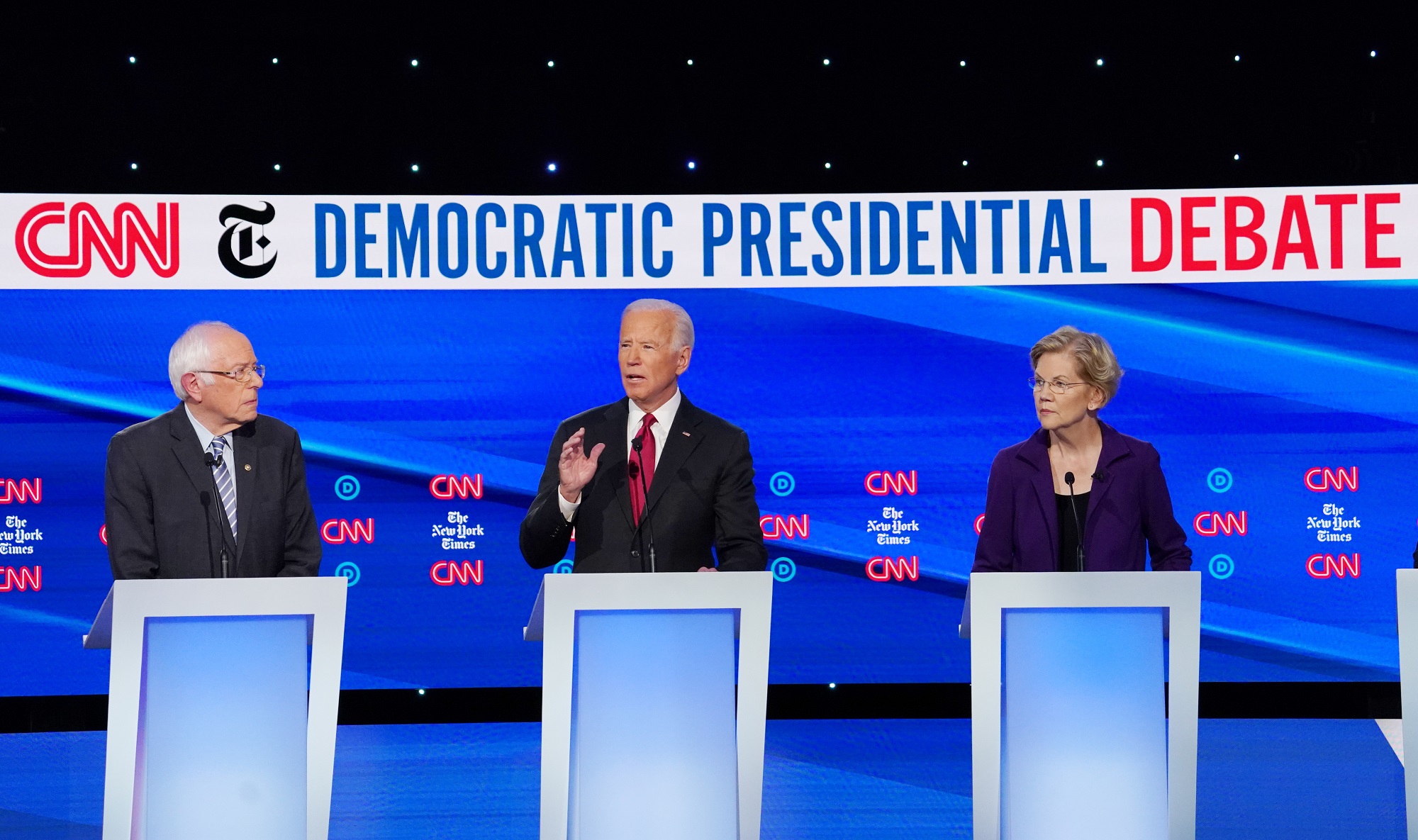 Democratic presidential candidate former Vice President Biden speaks as Senators Warren and Sanders listen during the fourth U.S. Democratic presidential candidates 2020 election debate at Otterbein University in Westerville, Ohio U.S.