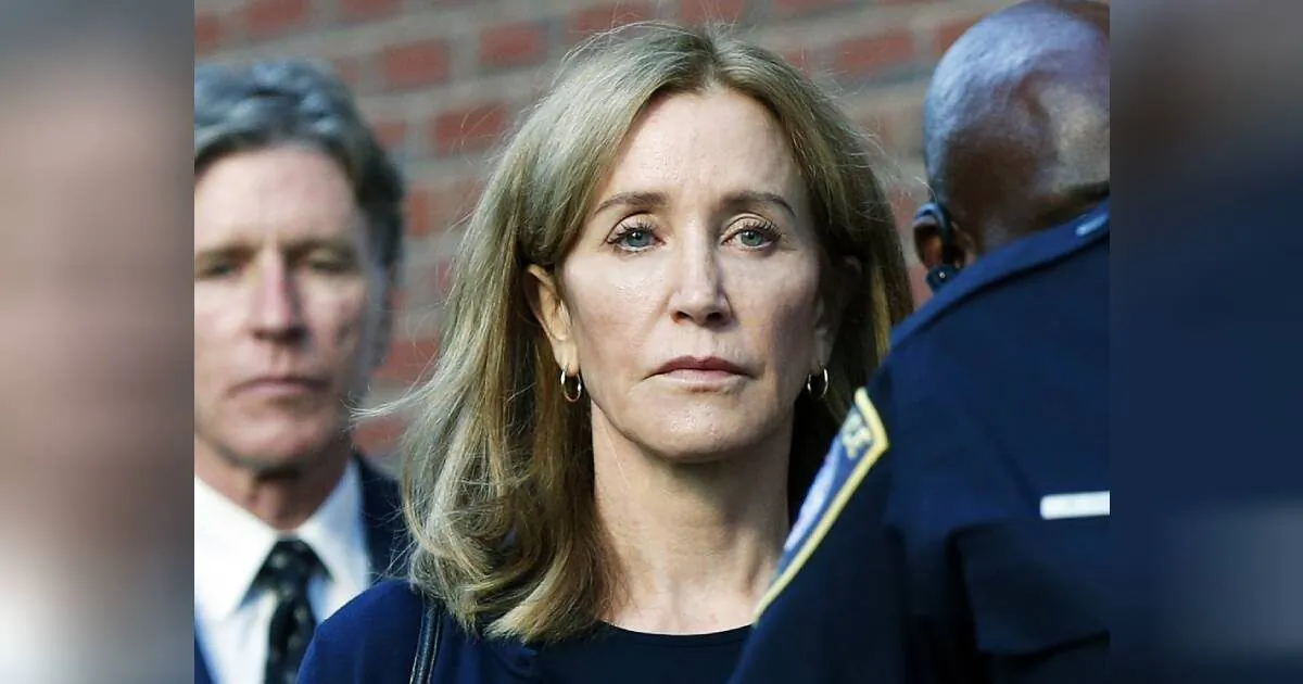 Felicity Huffman leaves federal court with her brother Moore Huffman Jr. following, after she was sentenced in a nationwide college admissions bribery scandal on Sept. 13, 2019, in Boston. (Michael Dwyer/AP)