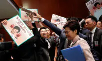 Hong Kong Leader Jeered out of Legislative Council During Policy Speech