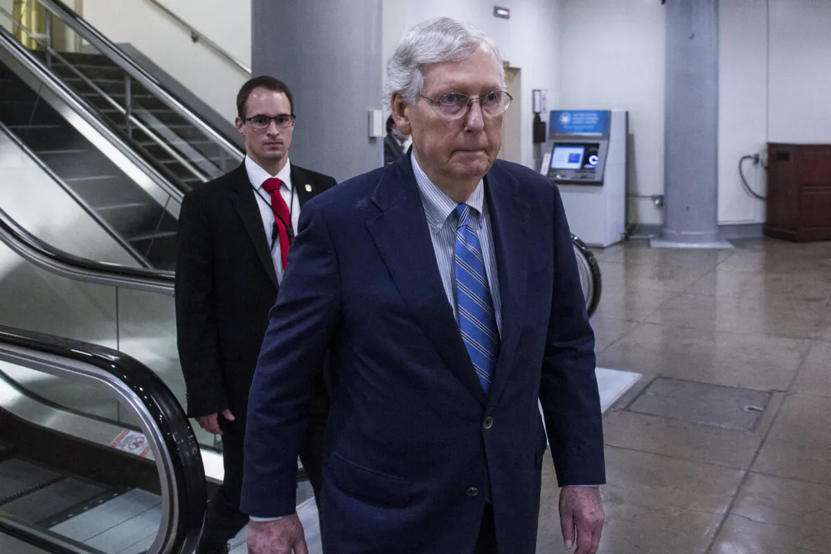 Senate Majority Leader Mitch McConnell (R-Ky.) walks through the Senate Basement on Capitol Hill in Washington on Oct. 15, 2019. (Photo by Zach Gibson/Getty Images)