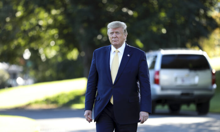 President Donald Trump heading to speak to media before departing the White House on Marine One on Oct. 11, 2019. (Charlotte Cuthbertson/The Epoch Times)