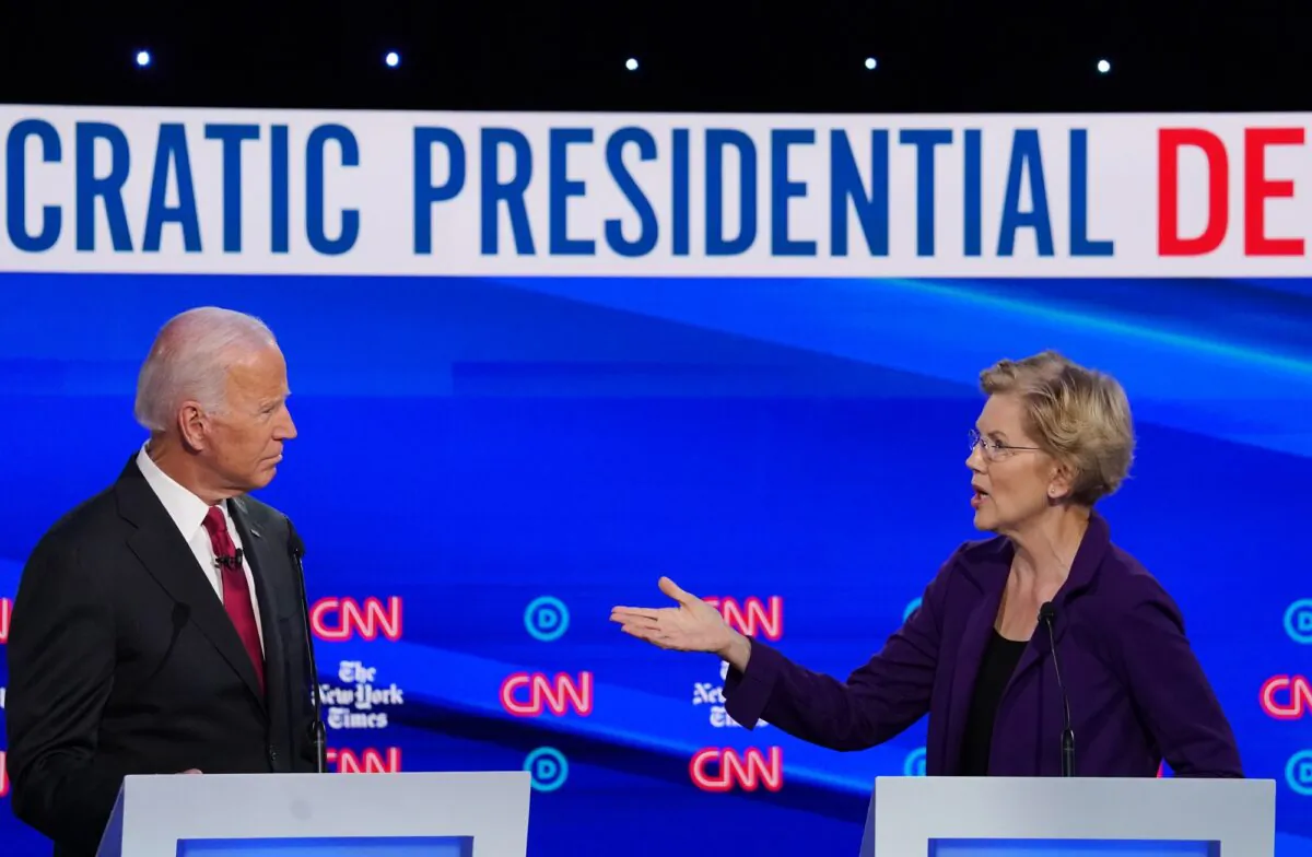 Sen. Elizabeth Warren (D-Mass.) speaks as former Vice President Joe Biden listens during the Democratic Presidential Debate at Otterbein University in Westerville, Ohio on Oct. 15, 2019. (Win McNamee/Getty Images)