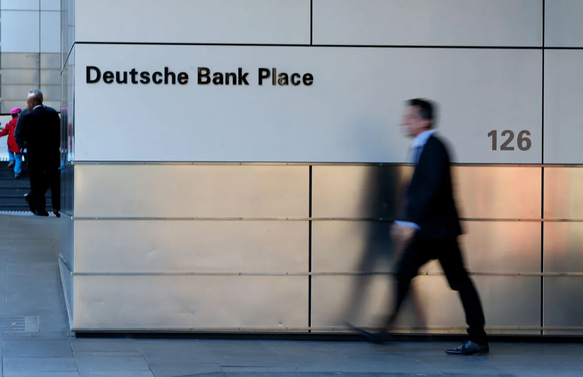 A man walks by Deutsche Bank signage in Sydney on July 9, 2019. (Don Arnold/Getty Images)