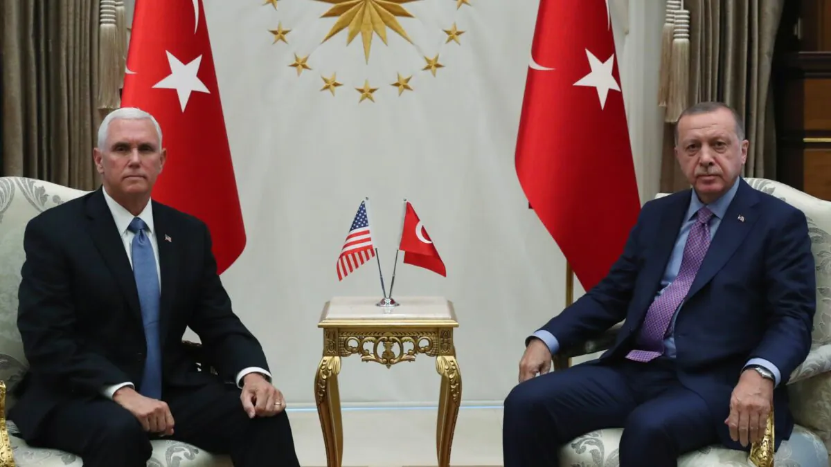 Turkish President Tayyip Erdogan meets with U.S. Vice President Mike Pence at the Presidential Palace in Ankara, Turkey on Oct. 17, 2019. (Murat Cetinmuhurdar/Presidential Press Office/Handout via Reuters)