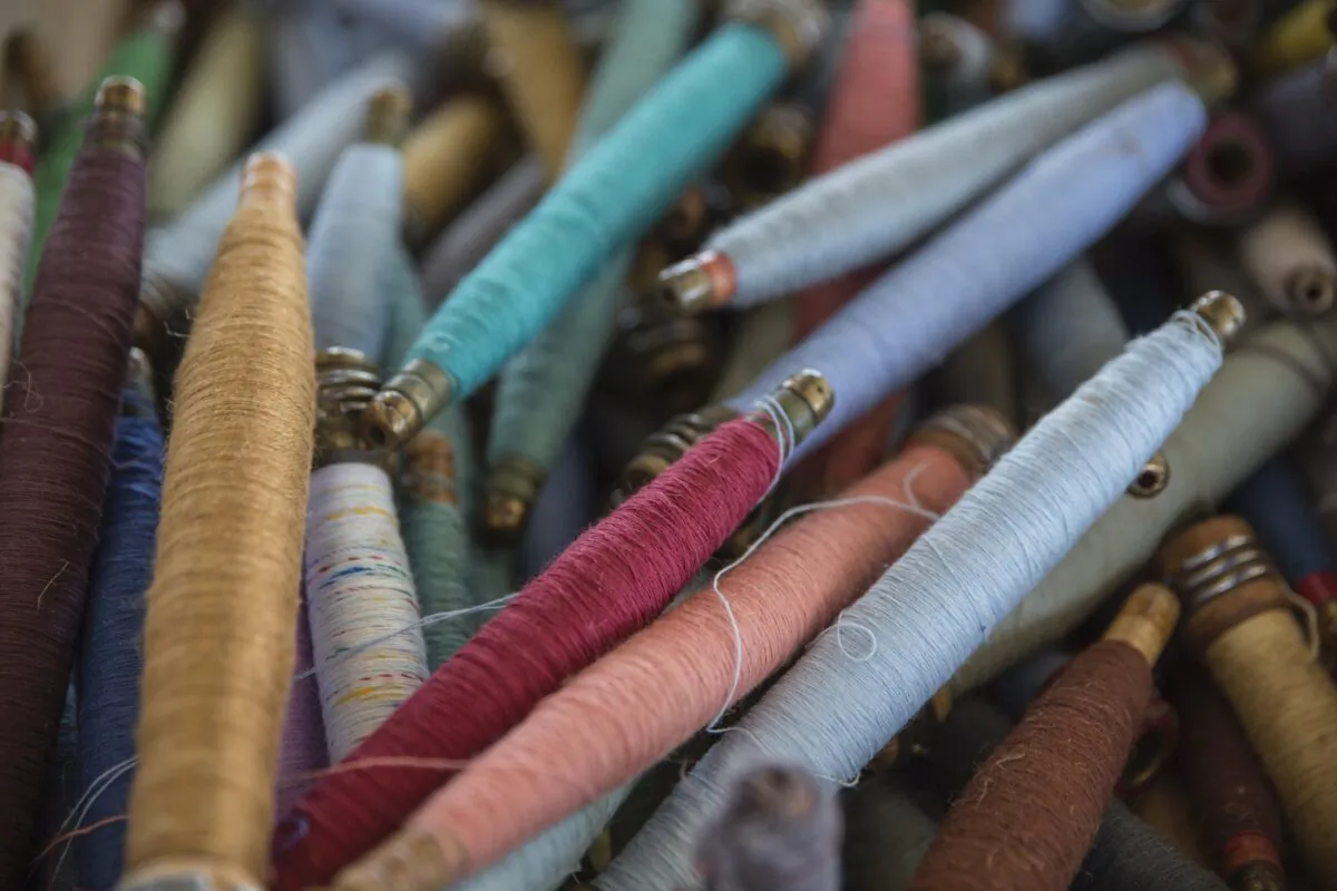 Stock image of pile of thread. (Terri Bleeker/Unsplash)
