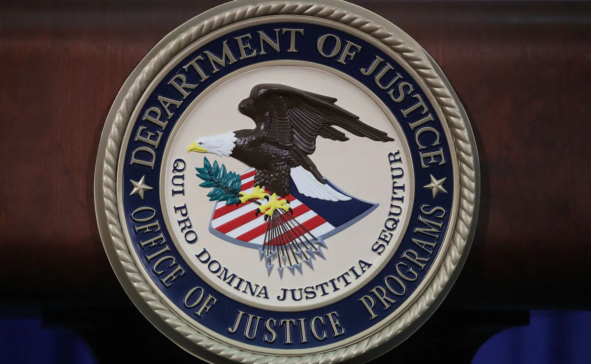 The Justice Department seal is seen on the lectern during a Hate Crimes Subcommittee summit in Washington, on June 29, 2017. (Mark Wilson/Getty Images)