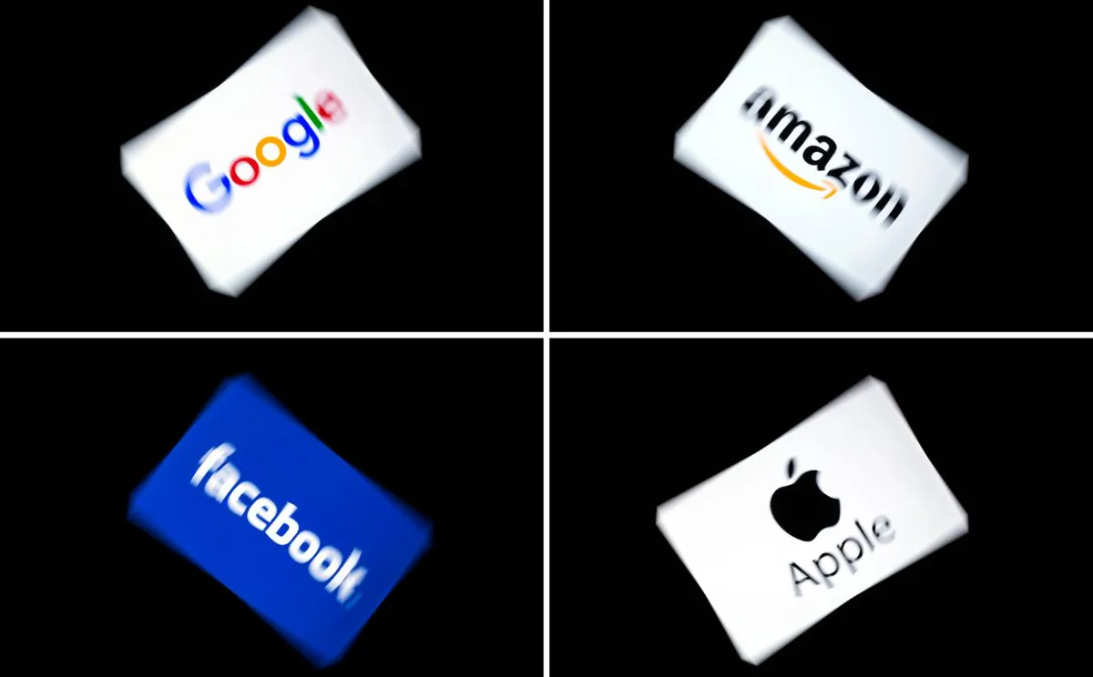 (COMBO) This combination of pictures shows the logos of Google, Facebook Amazon, and Facebook displayed on a tablet in Paris, on Feb. 18, 2019. (Lionel Bonaventure/AFP via Getty Images)