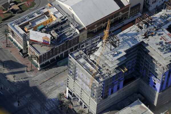 One of two large cranes collapses