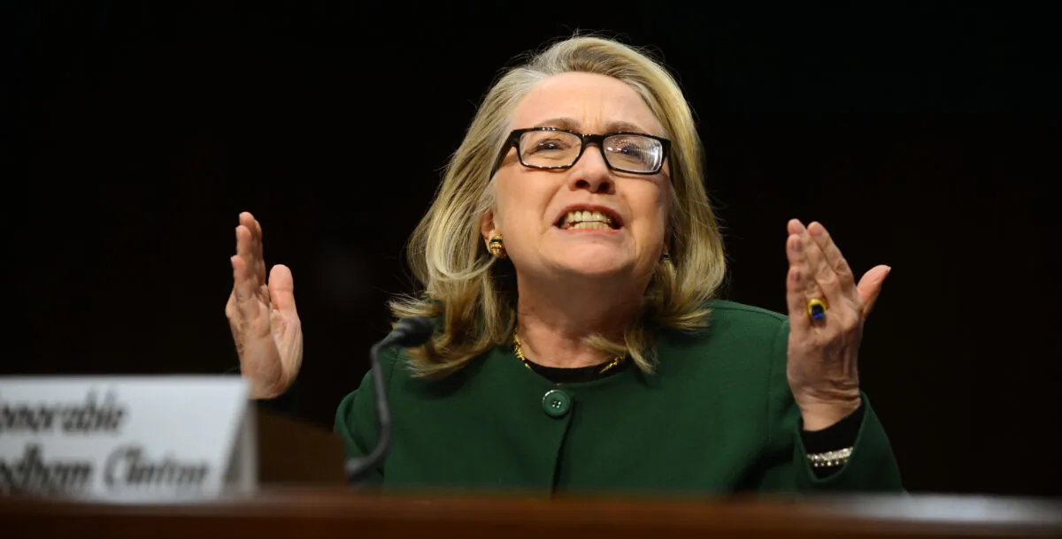 Then-Secretary of State Hillary Clinton testifies before the Senate Foreign Relations Committee on the September 11, 2012 attack on the US mission in Benghazi, Libya, during a hearing on Capitol Hill in Washington on Jan. 23, 2013. (SAUL LOEB/AFP/Getty Images)