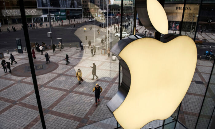 The Apple logo is seen on the window at an Apple Store in Beijing, China, on Jan. 7, 2019. (Kevin Frayer/Getty Images)