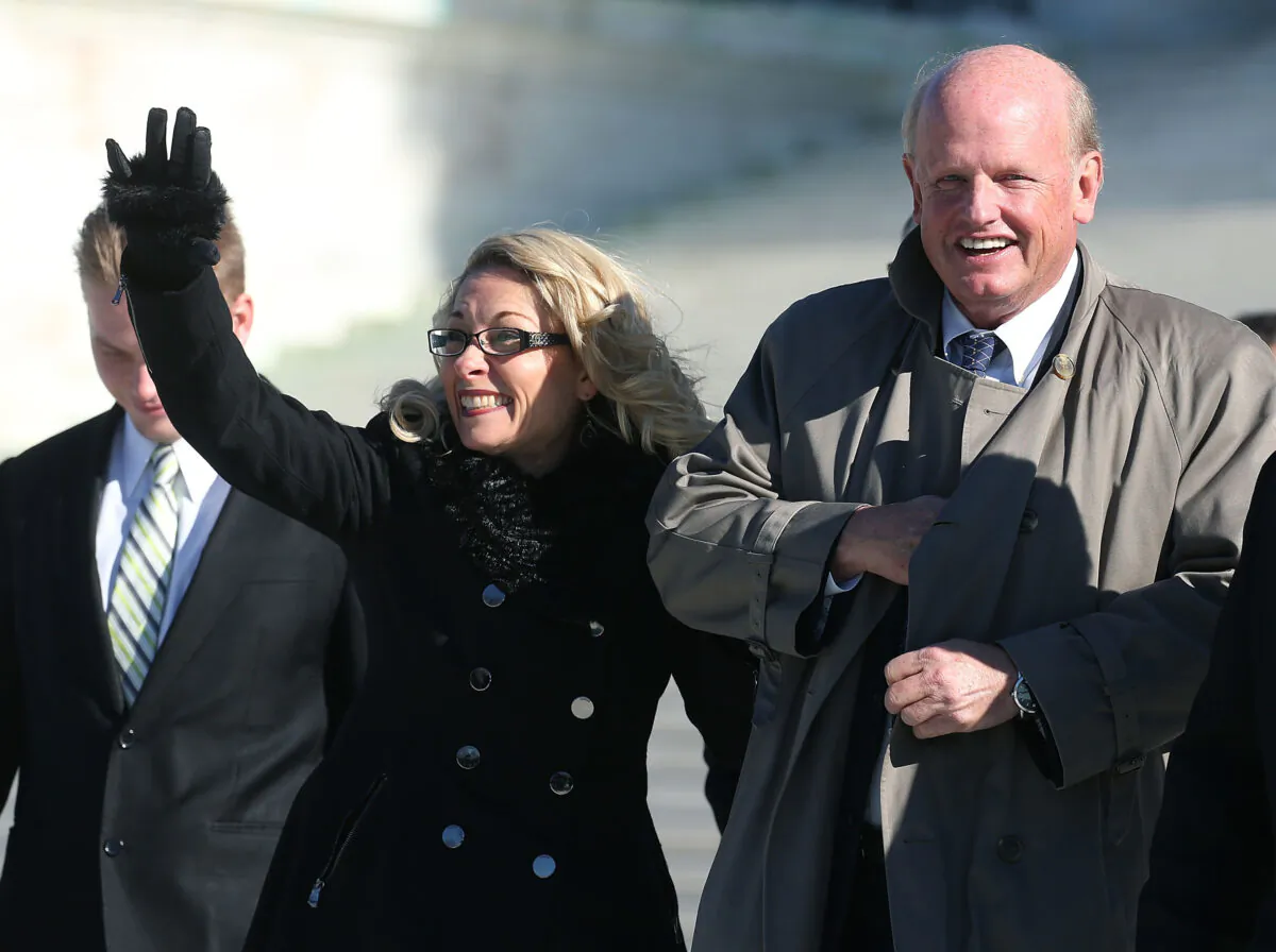 Rebecca Friedrichs walks with lead counsel Michael Carvin after arguments at the US Supreme Court in Washington on Jan. 11, 2016. The high court is hearing arguments in the Friedrichs v. California Teachers Association case (Mark Wilson/Getty Images)