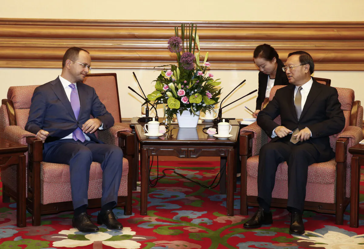 Albania Foreign Minister Ditmir Bushati  (L) and Chinese State Councilor Yang Jiechi (R) hold a meeting at the Zhongnanhai Leadership Compound in Beijing, China on Aug. 26, 2016. The two officials are meeting to boost bilateral ties between the two countries. (Rolex Dela Pena-Pool/Getty Images)