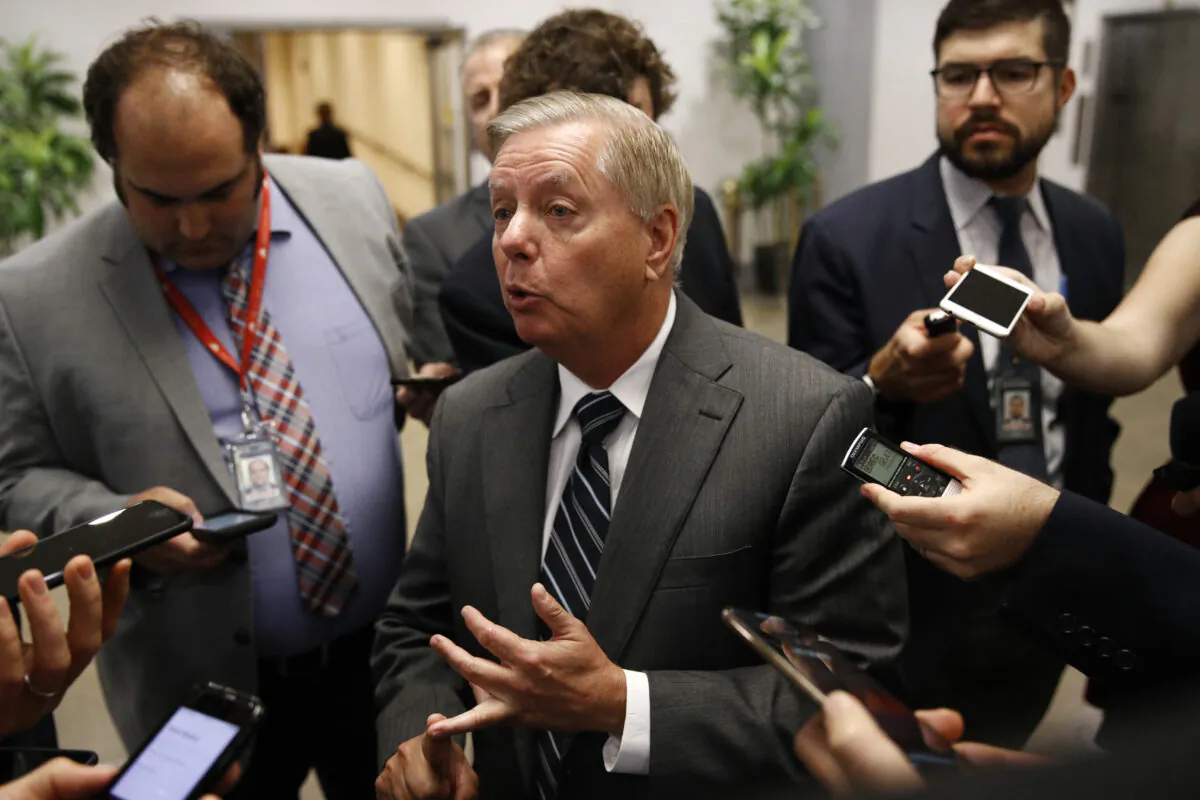 Senate Judiciary Chairman Lindsey Graham (R-S.C.) speaks with members of the media on Capitol Hill in Washington on Oct. 22, 2019. (Patrick Semansky/AP Photo)