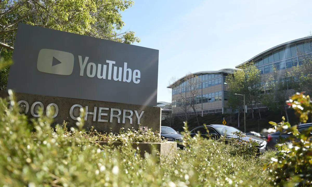 A YouTube sign is seen at YouTube's corporate headquarters in San Bruno, California on April 03, 2018. (Josh Edelson/AFP/Getty Images)