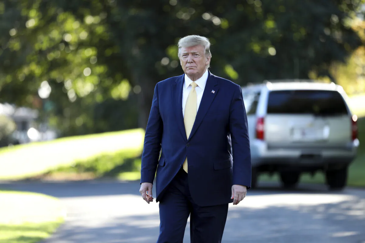 President Donald Trump speaks to media before departing the White House on Marine One on Oct. 11, 2019. (Charlotte Cuthbertson/The Epoch Times)