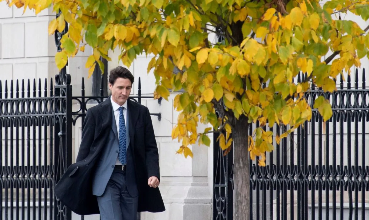 Prime Minister Justin Trudeau walks to his first news conference since being re-elected on Oct. 23, 2019 in Ottawa. (The Canadian Press/Adrian Wyld)