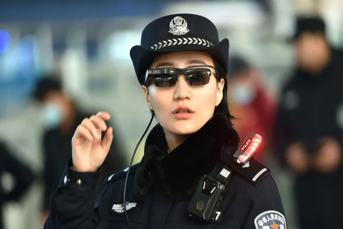 A police officer wearing a pair of smart glasses fitted with a facial recognition system at the Zhengzhou East Railway Station in Zhengzhou City, in China's central Henan Province on Feb. 5, 2018. (AFP/Getty Images)