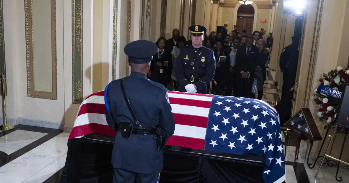 Guests pay respects to the late Rep. Elijah Cummings (D-MD) as his remains lie in state outside the House Chamber of the U.S. Capitol Oct. 24, 2019 in Washington, DC. (Tom Williams-Pool/Getty Images)