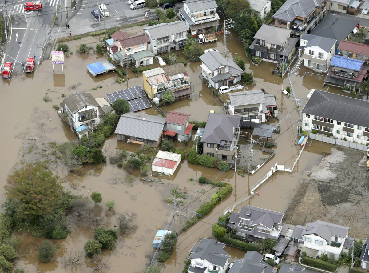 A flooded residential area after a heavy rain is seen in Sakura, Chiba prefecture, east of Tokyo, Japan on Oct. 26, 2019. (Kyodo/via Reuters)