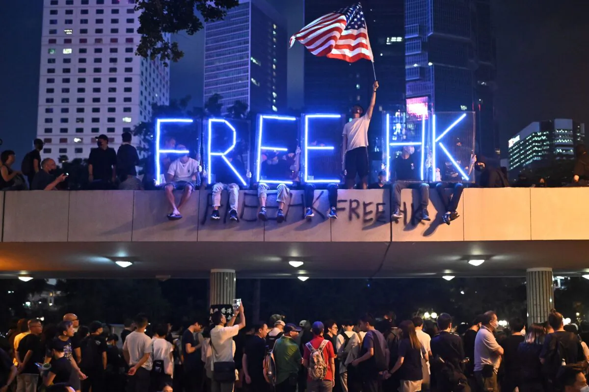 A light installation that reads "Free HK" is seen as people take part in a rally of healthcare professionals in Hong Kong's Central district on Oct. 26, 2019. (Philip Fong/AFP via Getty Images)