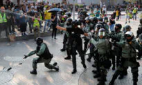Hong Kong Protesters in Standoff With Police After Tear Gas Breaks up Rally