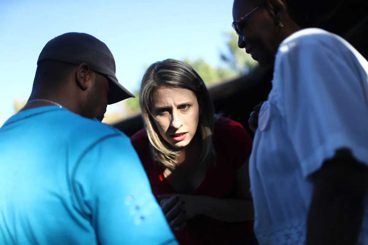 Democratic congressional candidate Katie Hill speaks to a supporter at a campaign Halloween carnival in Lancaster, Calif., on Oct. 21, 2018. (Mario Tama/Getty Images)