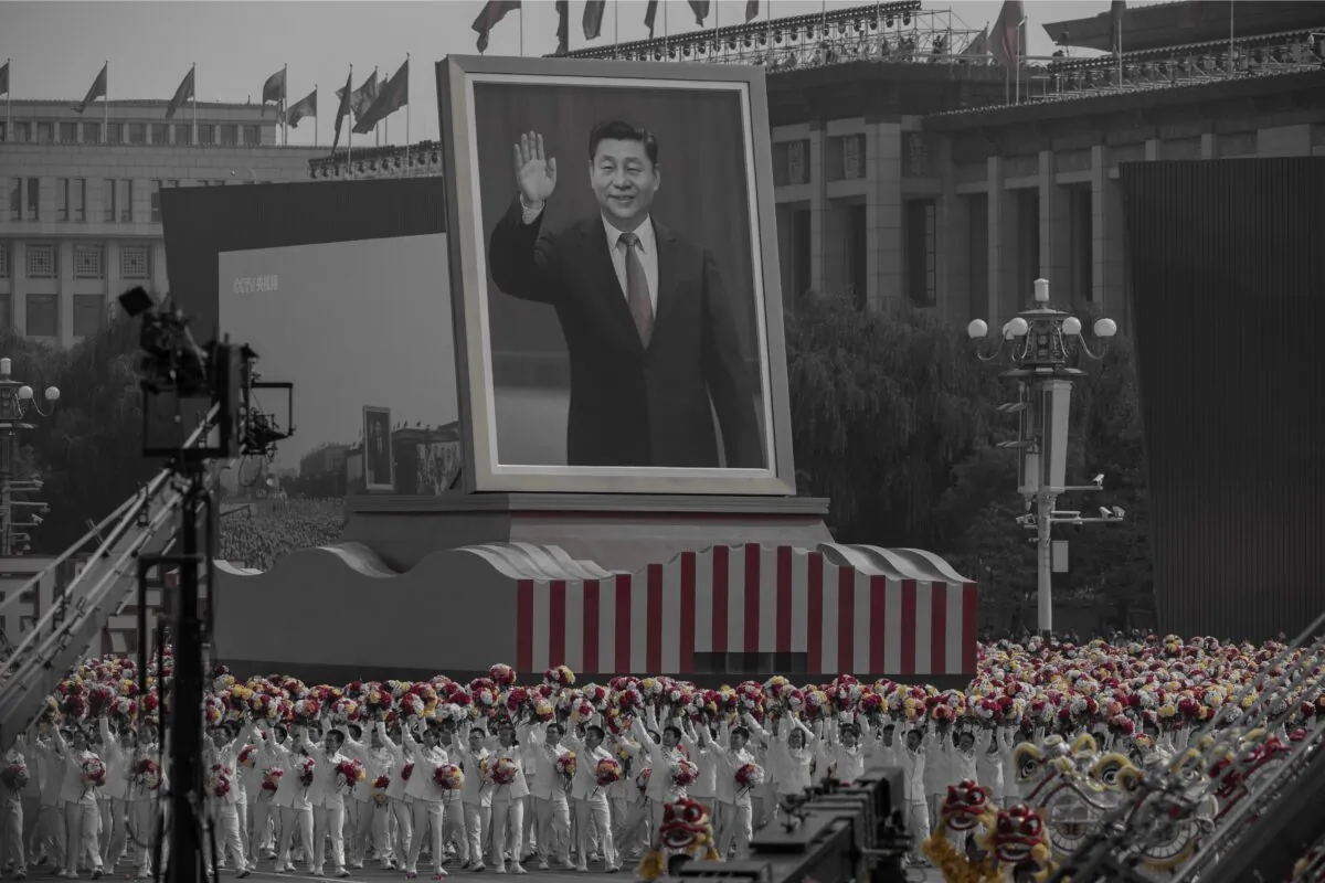 A giant portrait of Chinese leader Xi Jinping is carried atop a float at parade to celebrate the 70th Anniversary of the Chinese Communist Party’s ruling at Tiananmen Square in Beijing, China, on Oct. 1, 2019. (Kevin Frayer/Getty Images)