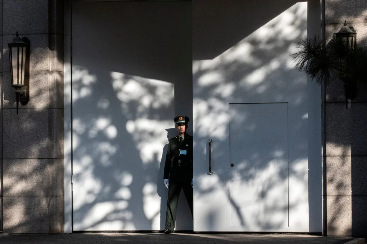 A Chinese paramilitary soldier secures an entrance of Jingxi hotel where the fourth plenary session of the CCP is being held in Beijing on Oct. 28, 2019. (Nicolas Asfouri/AFP via Getty Images)