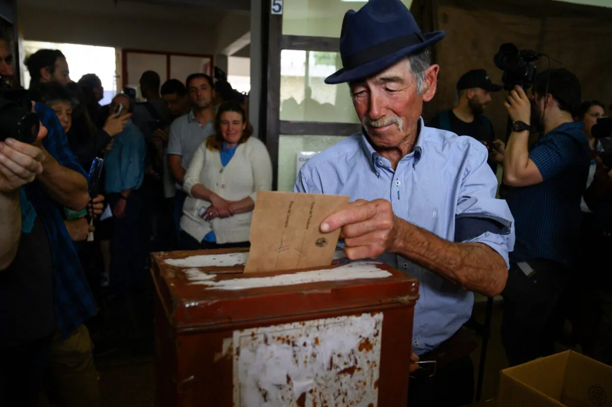 A man votes at a polling station in Montevideo during Uruguay's general election on Oct. 27, 2019. (Pablo Porciuncula Brune/AFP via Getty Images)