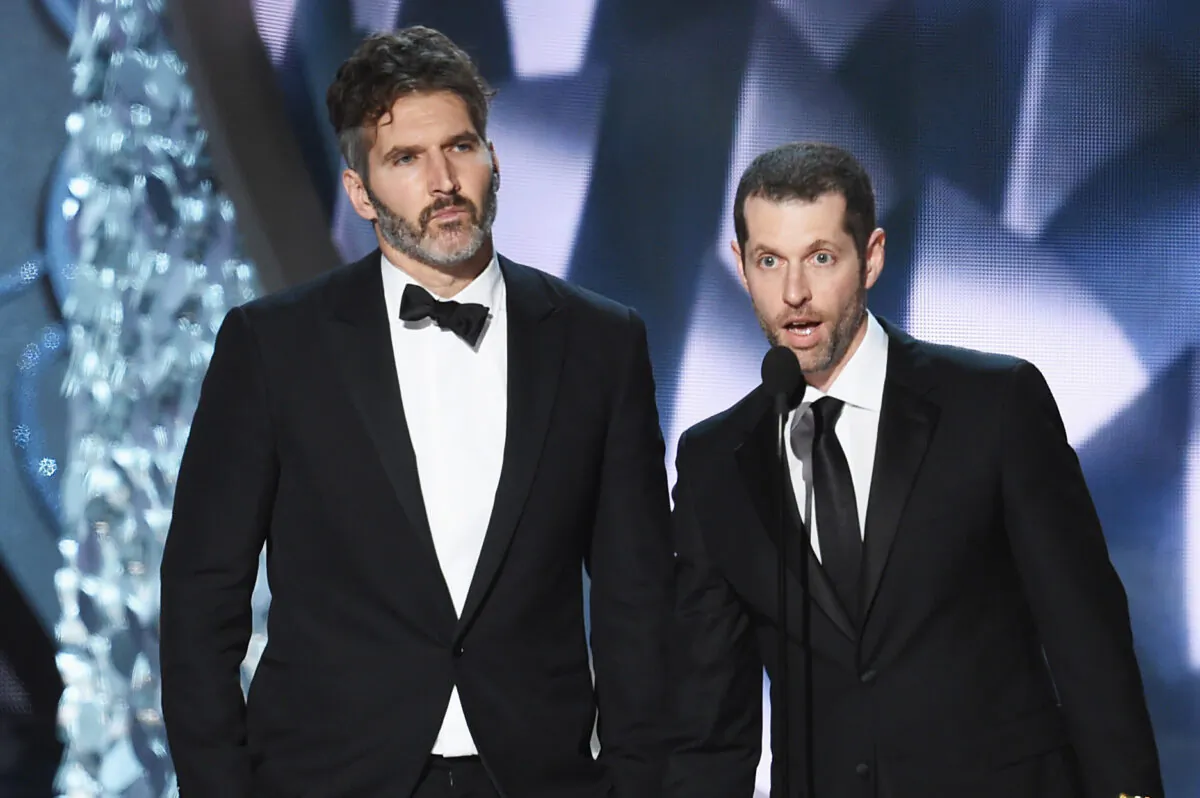 Writer/producers David Benioff (L) and D.B. Weiss (R) accept Outstanding Writing for a Drama Series during the 68th Annual Primetime Emmy Awards at Microsoft Theater in Los Angeles, Calif., on Sept. 18, 2016. (Kevin Winter/Getty Images)