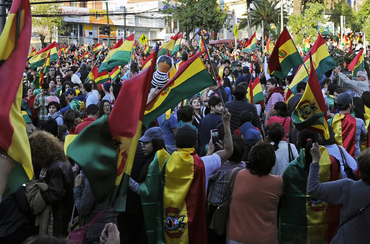 People attend an open meeting called by civic committees to protest against the election results in La Paz, Bolivia, on Oct. 27, 2019. (JORGE BERNAL/AFP via Getty Images)