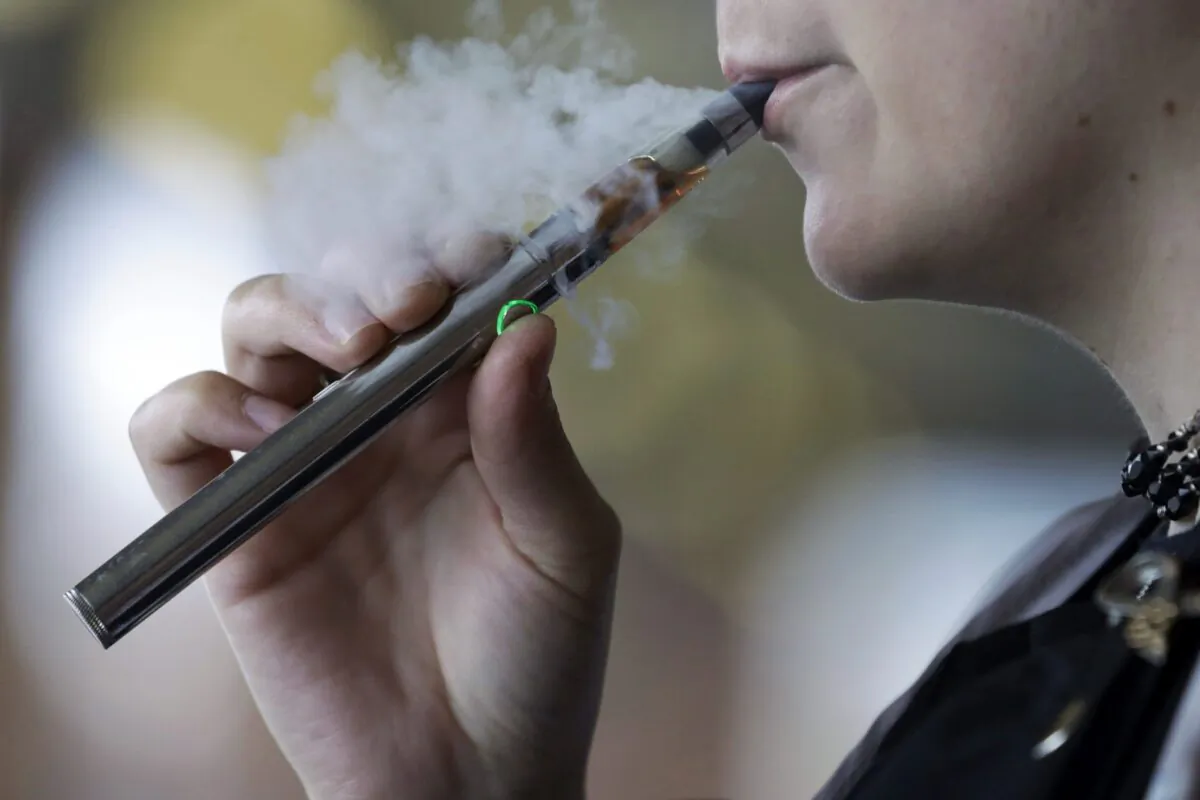 British Columbia's school trustees are asking for help to stop students from vaping. Members have approved a motion urging federal and provincial governments to make funding available for vape education and cessation for students. (AP Photo/Tony Dejak, File)