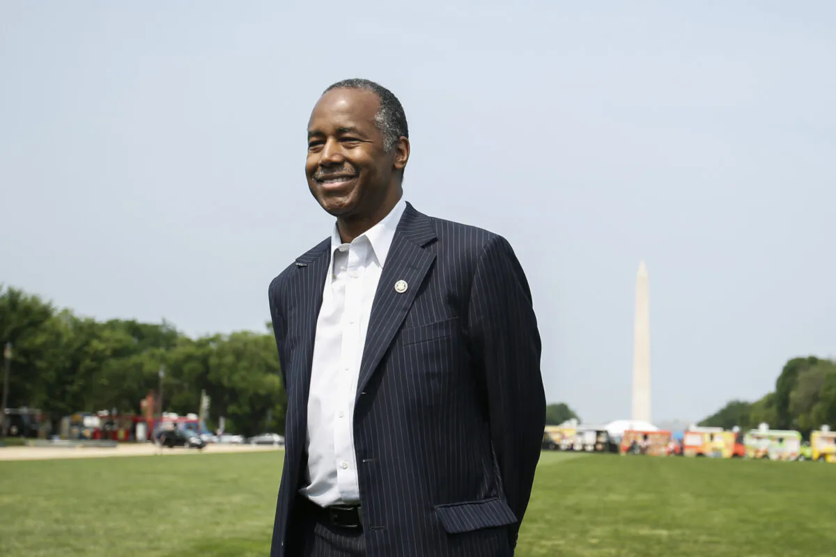 Secretary of Housing and Urban Development Ben Carson answers questions from the press on the National Mall in Washington on June 1, 2019. (Samira Bouaou/The Epoch Times)
