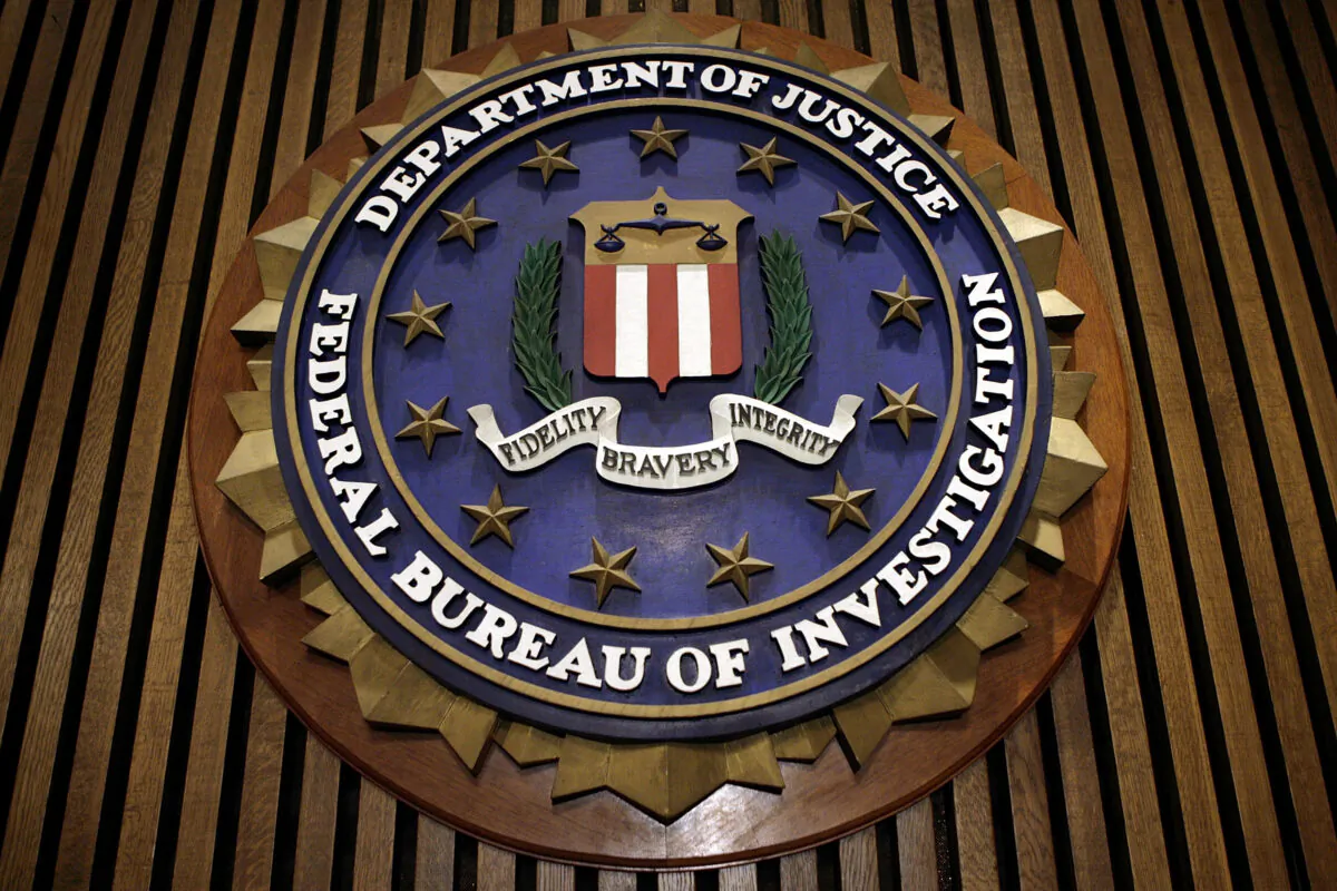 The seal of the F.B.I. hangs in the Flag Room at the bureau's headquaters  in Washington, D.C., on March 9, 2007. (Chip Somodevilla/Getty Images)