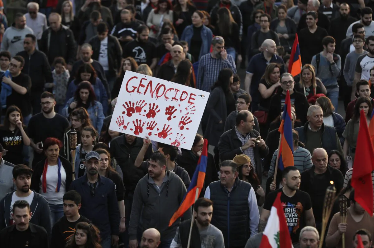 Lebanese Armenians rally with flags and placards in the capital Beirut on April 24, 2019, to commemorate the 104th anniversary of the mass killings of Armenians under the Ottoman Empire in 1915. (Joseph Eid/AFP/Getty Images)