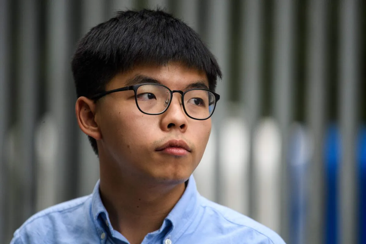 Pro-democracy activist Joshua Wong speaks to the media outside the Legislative Council (LegCo) in Hong Kong on Oct. 29, 2019. (Anthony Wallace/AFP via Getty Images)