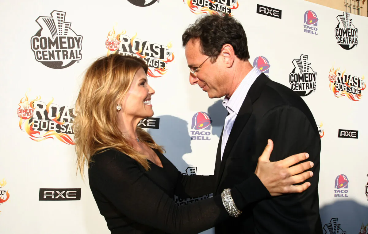 Actress Lori Loughlin and actor/comedian Bob Saget arrive to "Comedy Central Roast Of Bob Saget" at the Warners Brothers Studio Lot in Burbank, California on Aug. 3, 2008. (Photo by Alberto E. Rodriguez/Getty Images for Comedy Central)