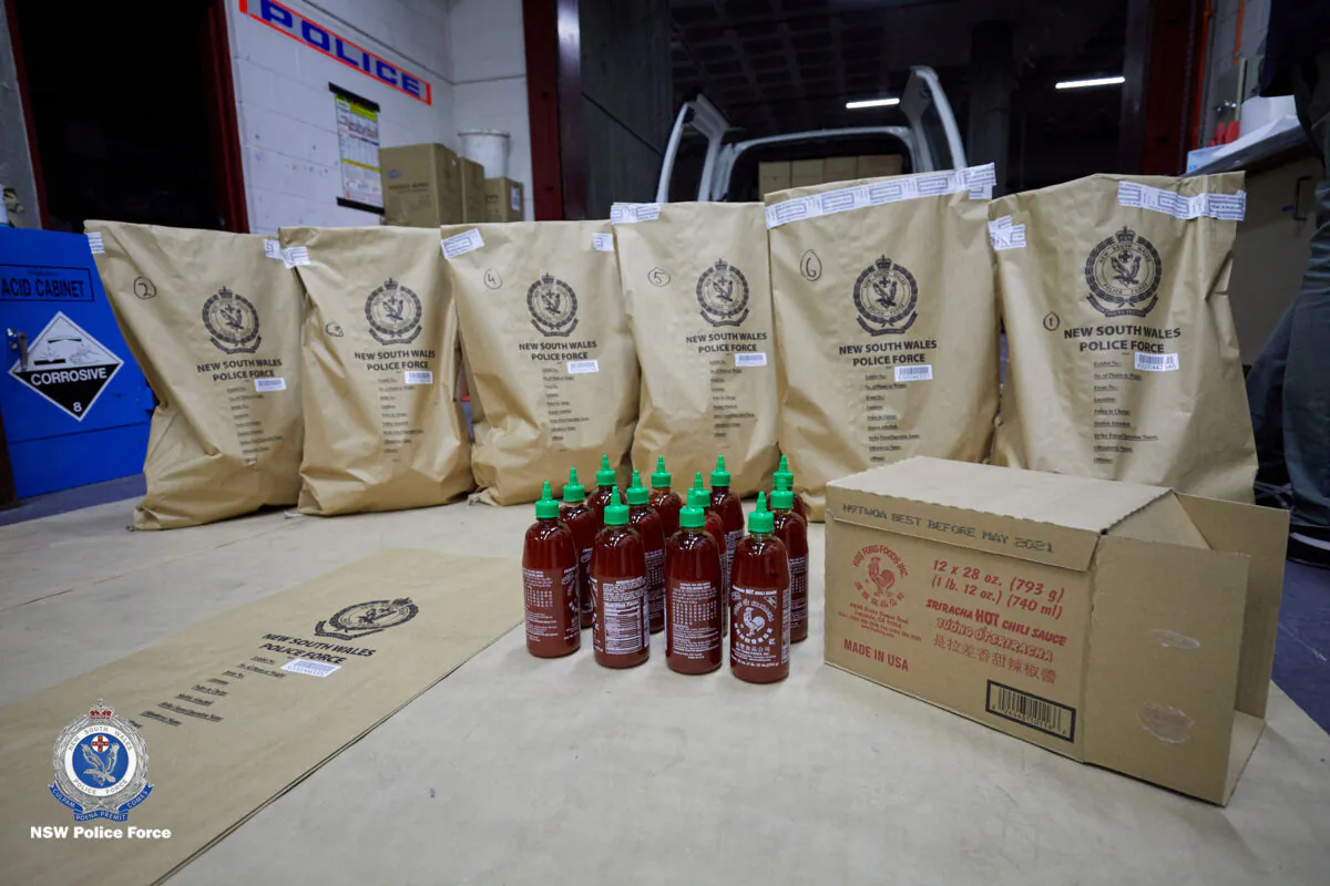 Seized bottles of sriracha hot chilli sauce, which were later found to conceal crystal meth, or ice, are seen in Sydney, Australia Oct. 15, 2019. Picture taken Oct. 15, 2019.  (New South Wales Police Force/Handout via Reuters)