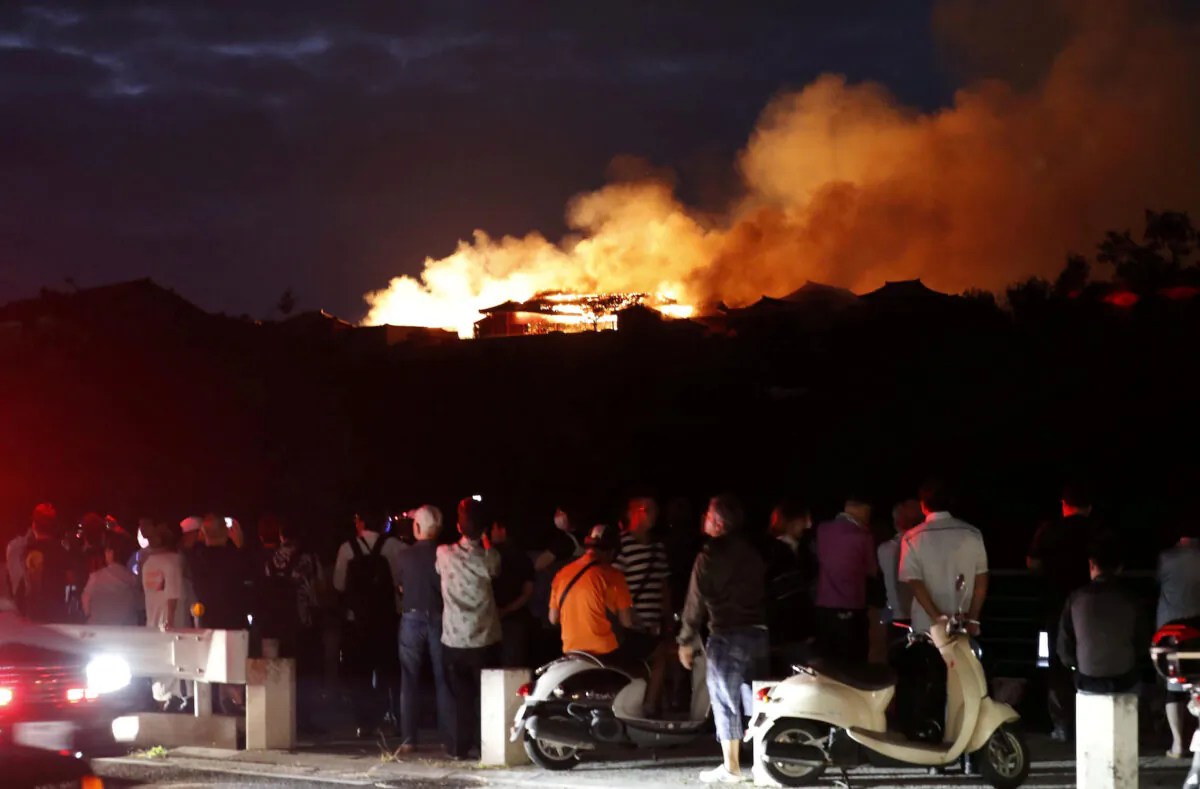 Shuri Castle, listed as a World Heritage site, goes up in flames, in Naha on the southern island of Okinawa, Japan, Oct. 31, 2019. (Kyodo/via Reuters)