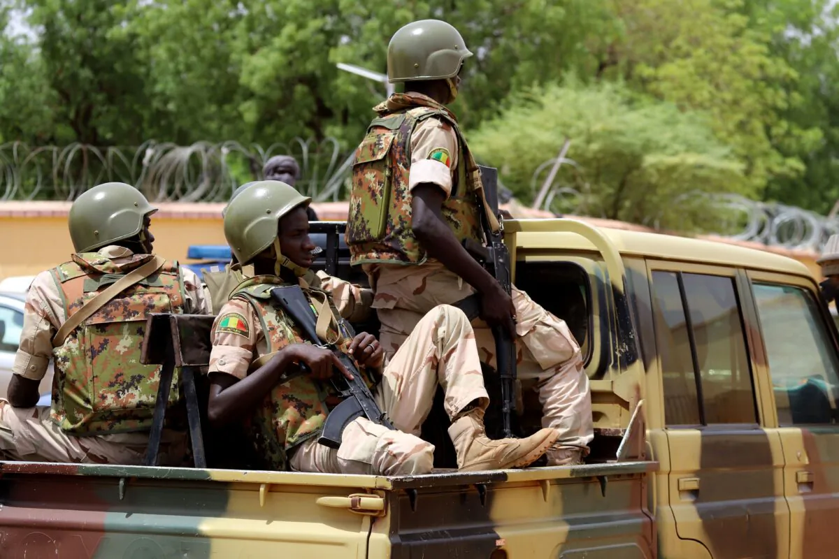 Members of the FAMA (Mali Armed Forces) patrol in the streets of Gao, Mali, on July 24, 2019. (Souleymane Ag Anara/AFP via Getty Images)