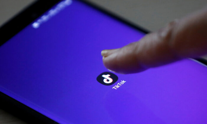 The logo of TikTok application is seen on a mobile phone screen in this picture illustration taken on Feb. 21, 2019. (Danish Siddiqui/Illustration/Reuters)