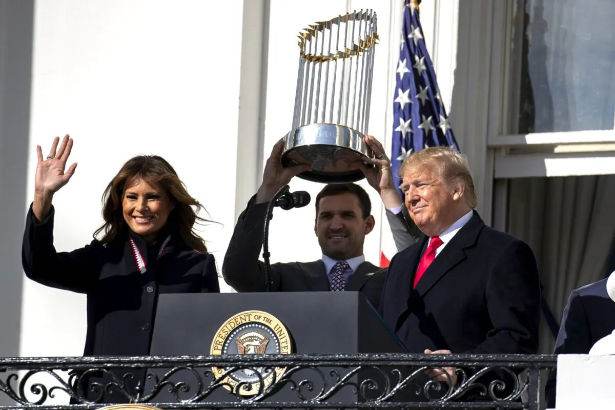 First Lady Melania Trump, Washington Nationals infielder Ryan Zimmerman, and President Donald Trump arrive for an event to honor the 2019 World Series Champion Washington Nationals, on the South Lawn of the White House, on Nov. 4, 2019. (Evan Vucci/AP Photo)