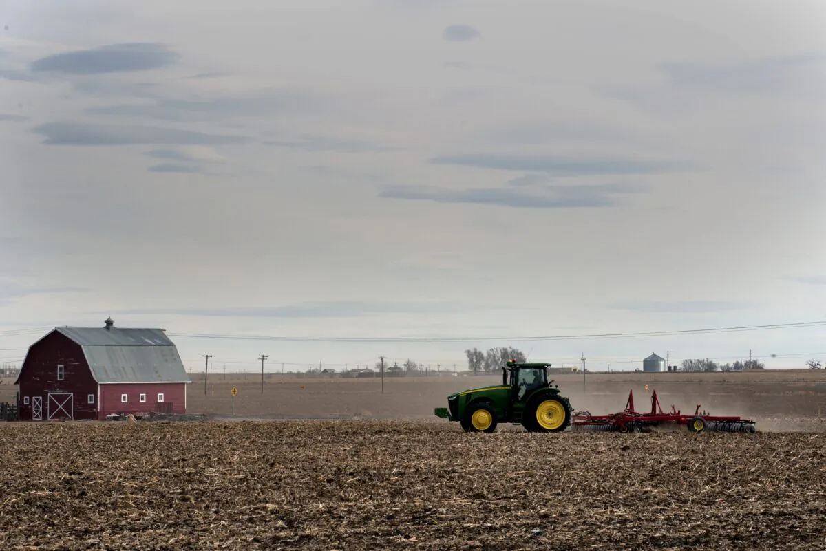 A farmer plows his fields in the small northeastern agricultural town of Eaton, Colorado, on Feb. 10, 2017.
With a population of just over 5,000 residents, 71% of the town's registered voters cast their ballots in support of President Donald Trump during the 2016 U.S. presidential election. (Jason Connolly/AFP via Getty Images)