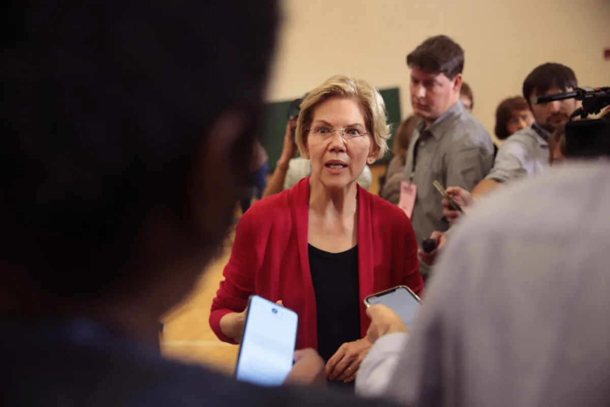 Democratic presidential candidate Sen. Elizabeth Warren (D-Mass.) speaks to the press during a campaign stop at Hempstead High School in Dubuque, Iowa on Nov. 2, 2019. (Scott Olson/Getty Images)