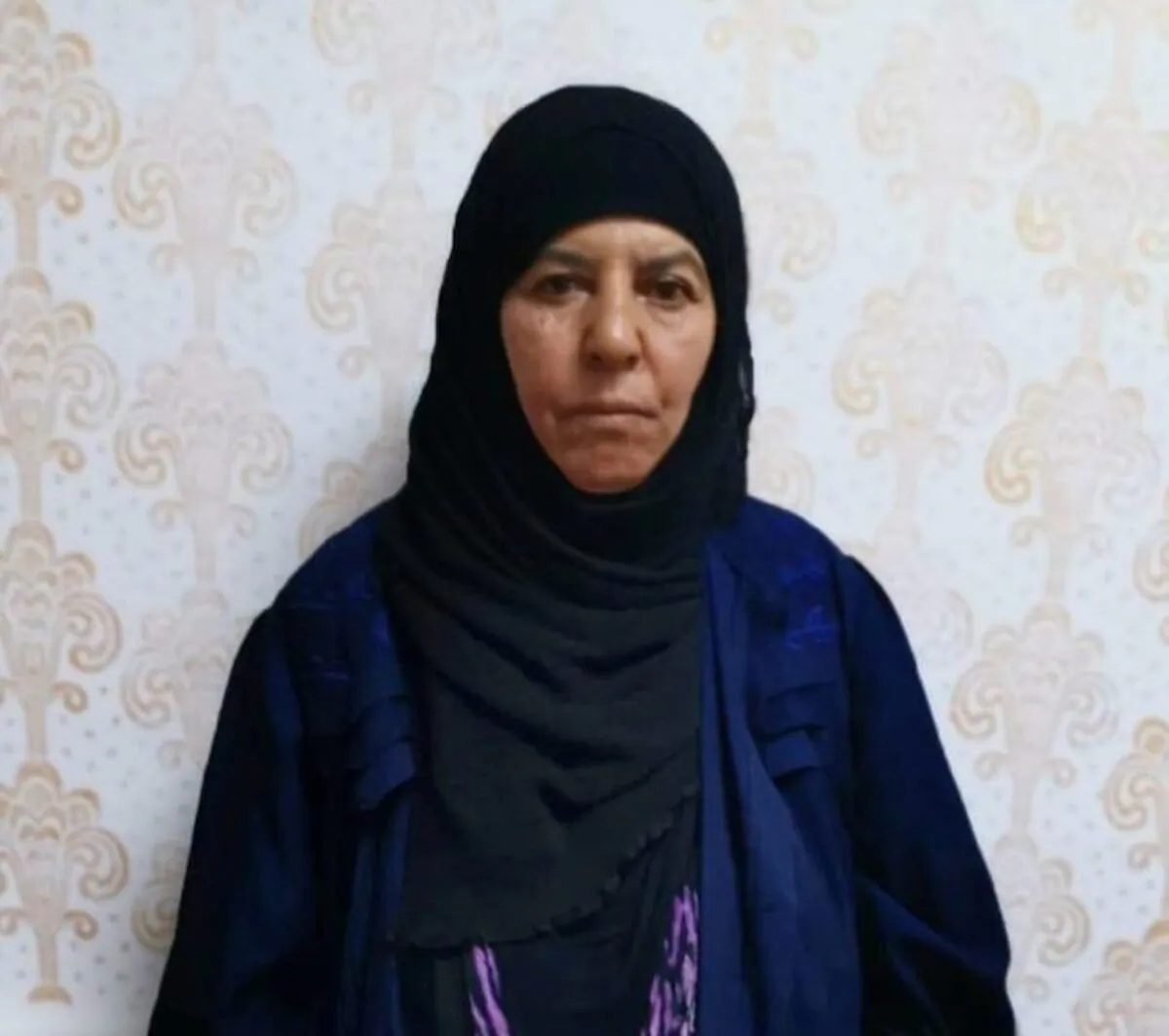 Rasmiya Awad, believed to be the sister of slain ISIS leader Abu Bakr al-Baghdadi, who was captured on Monday in the northern Syrian town of Azaz by Turkish security officials, is seen in an unknown location in an undated picture provided by Turkish security officials. (Turkish Security Officials/Handout via Reuters)