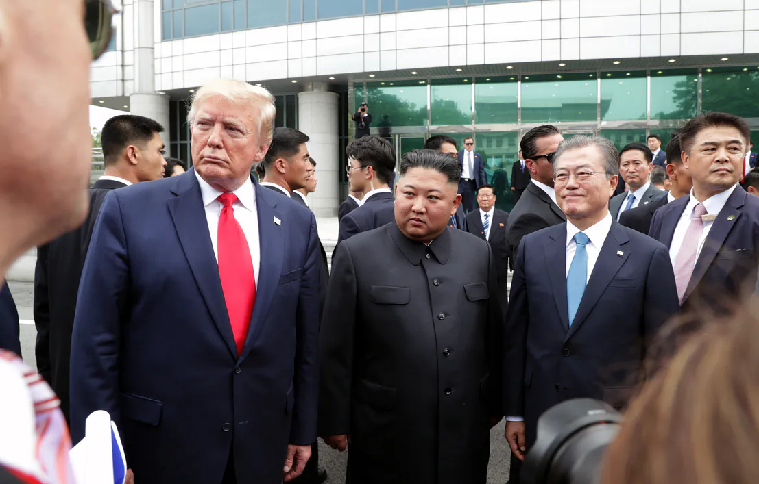 A handout photo provided by Dong-A Ilbo of North Korean leader Kim Jong Un, President Donald Trump, and South Korean President Moon Jae-in inside the demilitarized zone (DMZ) separating the South and North Korea in Panmunjom, South Korea on June 30, 2019. (Handout/Dong-A Ilbo via Getty Images)