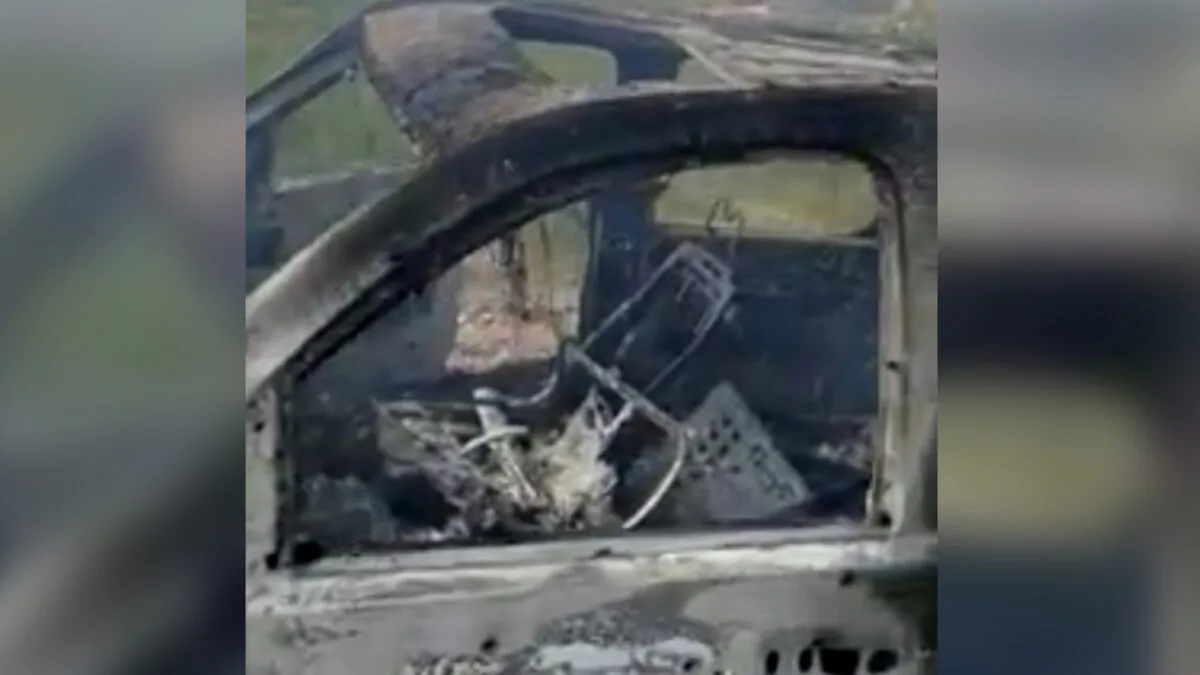 The burnt wreckage of a vehicle transporting a family living near the border with the United States is seen, after the family was caught in a crossfire between unknown gunmen from rival cartels, in Bavispe, Sonora, Mexico on Nov. 4, 2019. (Kenneth Miller/Lafe Langford Jr. via Reuters)